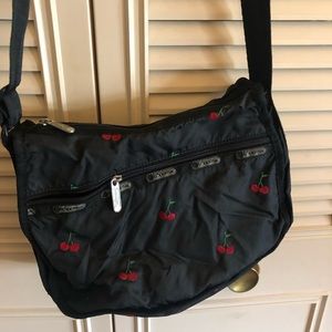 LeSportSac Classic Hobo crossbody. Black with cherry pattern